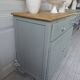 Buffet compacte  réenchantée en vert de gris, plateau bois.