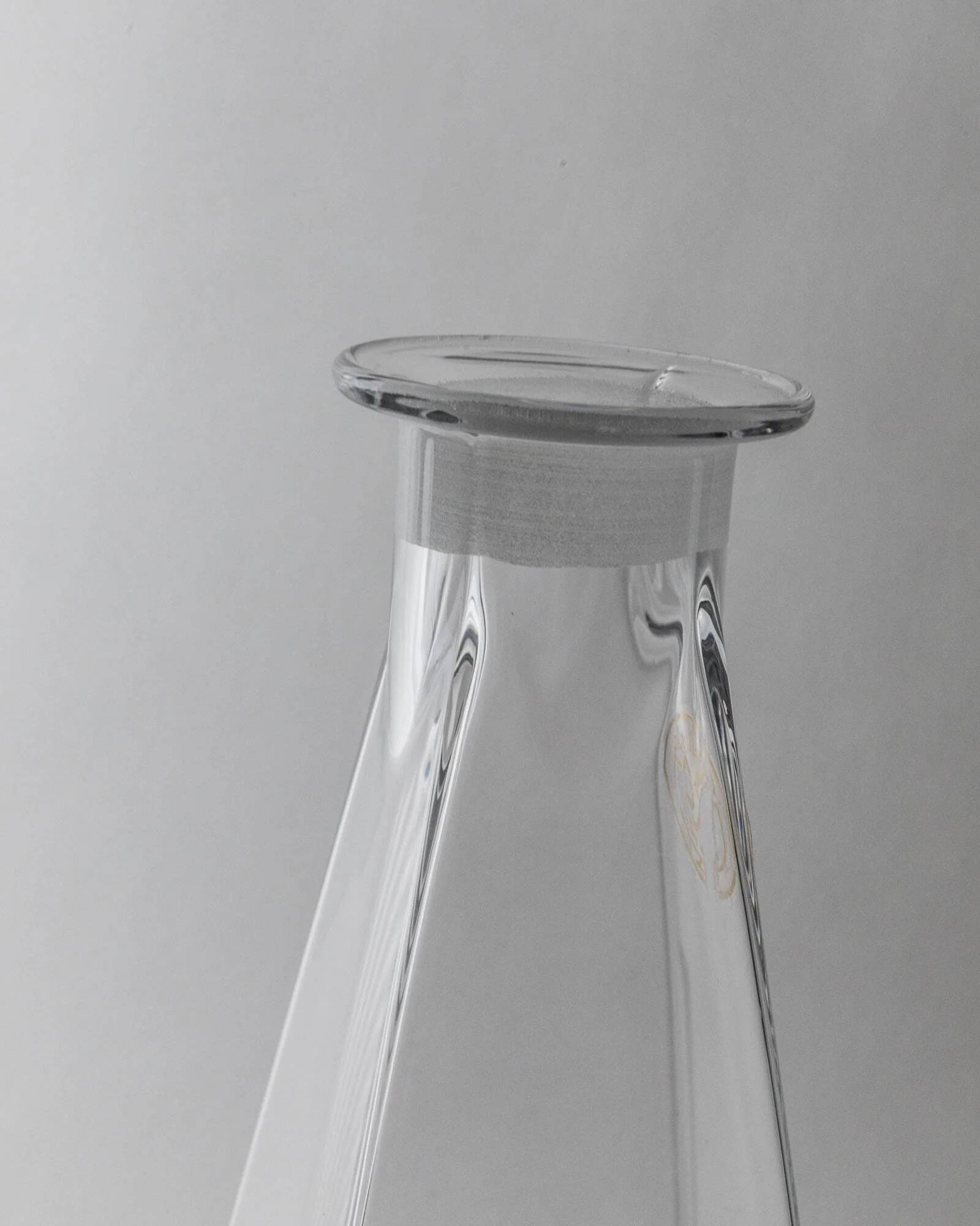 Vintage Murano glass decanter from the 1980s, transparent crystal pyramid with a spherical stopper, Linea 7.