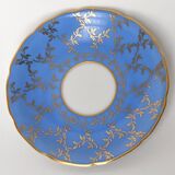 Tasse et sa sous-tasse en porcelaine