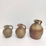 Set of three sandstone pitchers