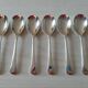 Set of 6 small silver metal spoons