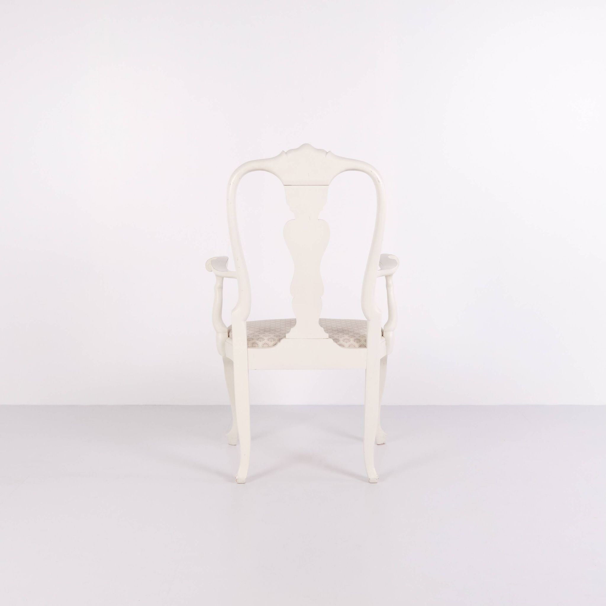 A pair of armchairs – neo rococo style – white painted with decorative details – 1920s