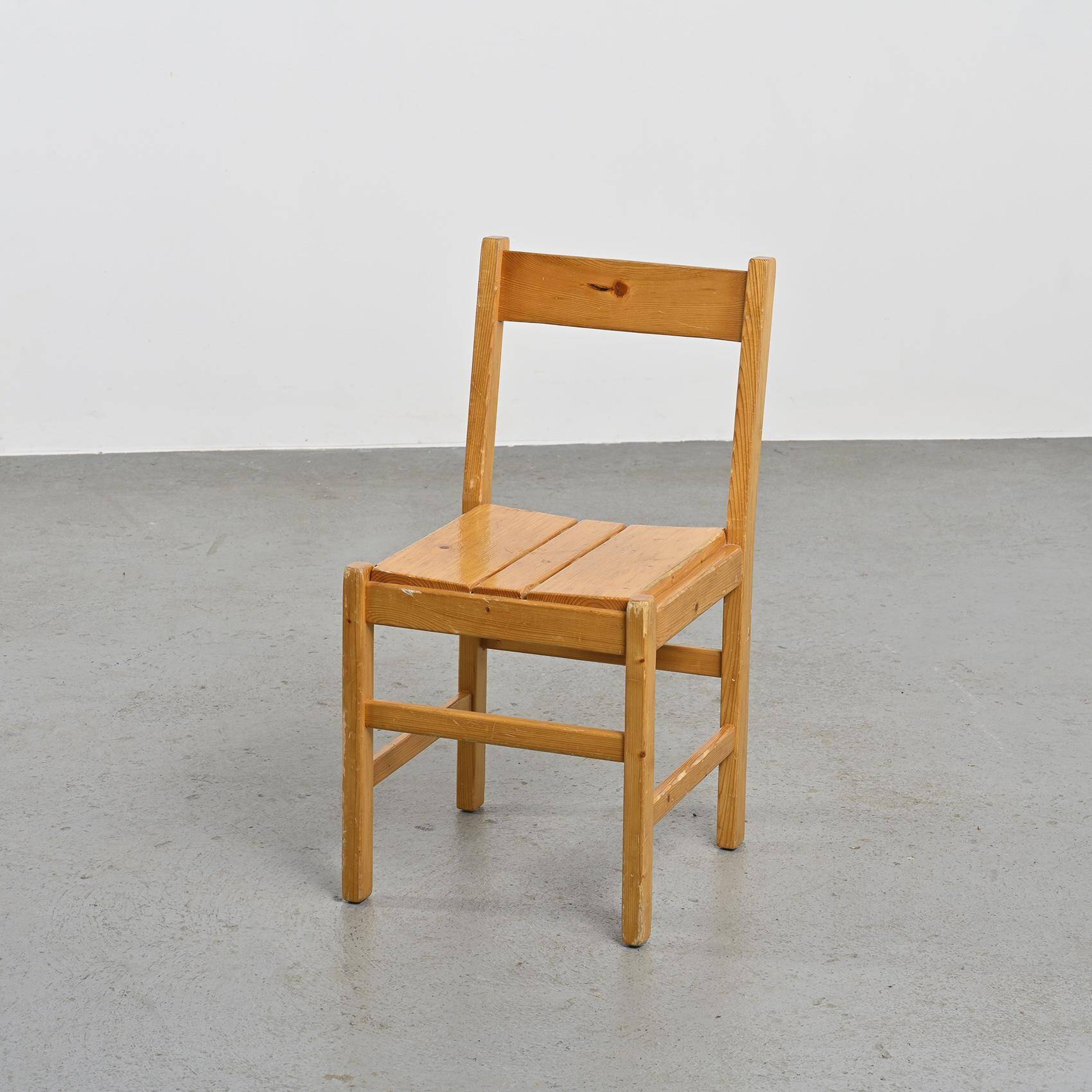 Set of six solid pine chairs by Maison Regain