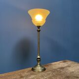 Ornate brass table lamp with mint green glass shade