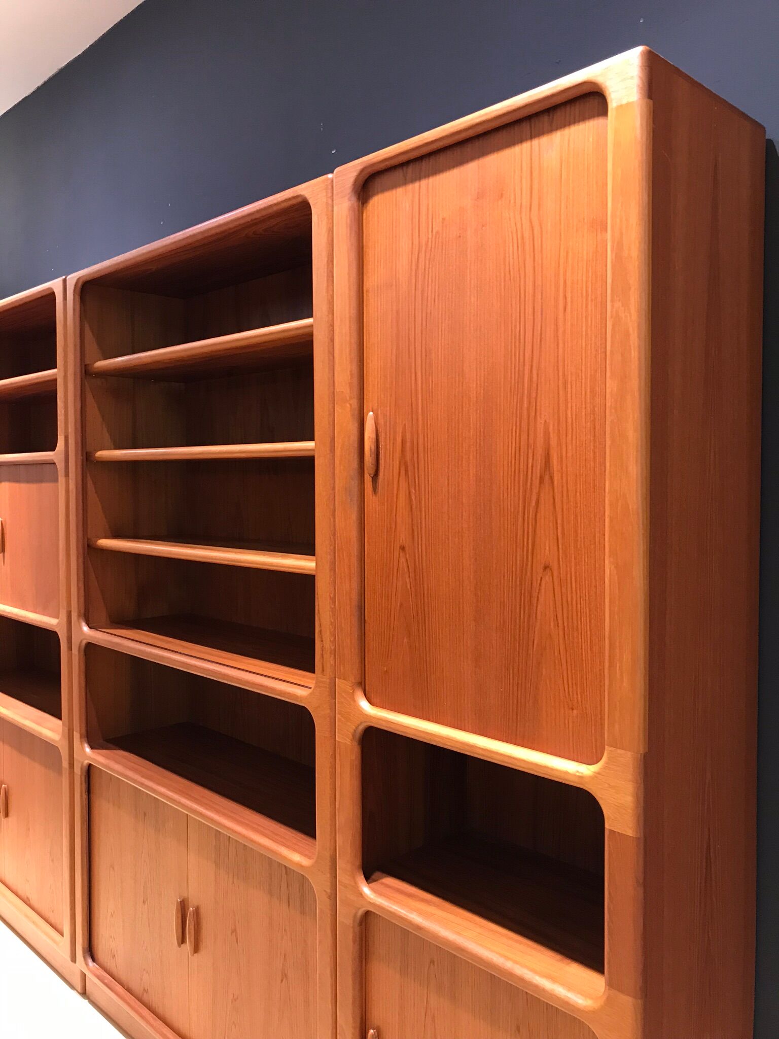 Teak wall system by Niels Bach for Dyrlund, 1970