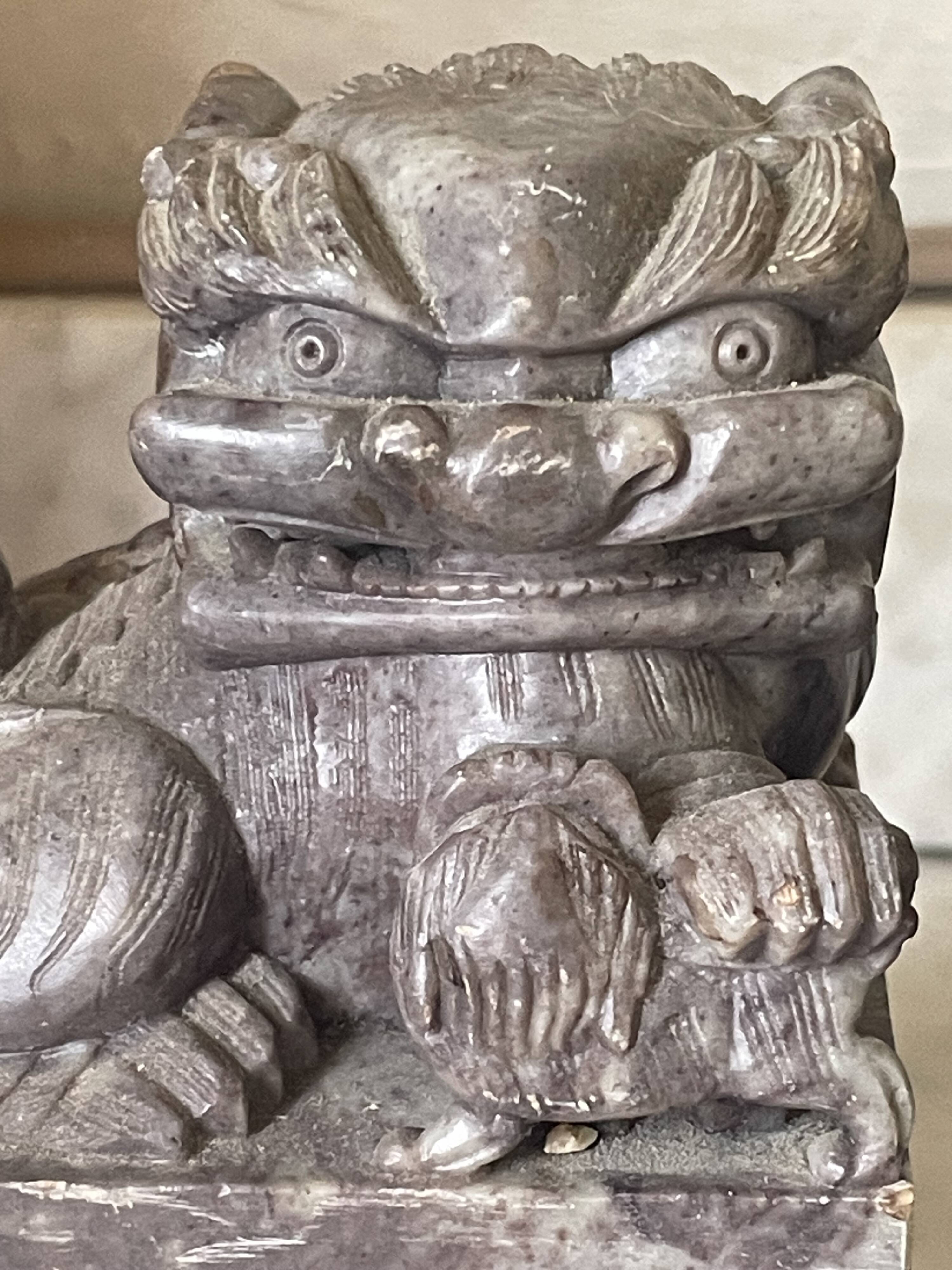 Pair of Foo Dog bookends in sculpted steatite.