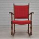 Chaise à bascule danoise des années 1960, d'origine en bon état, bois de chêne massif, tissu en laine d'ameublement.