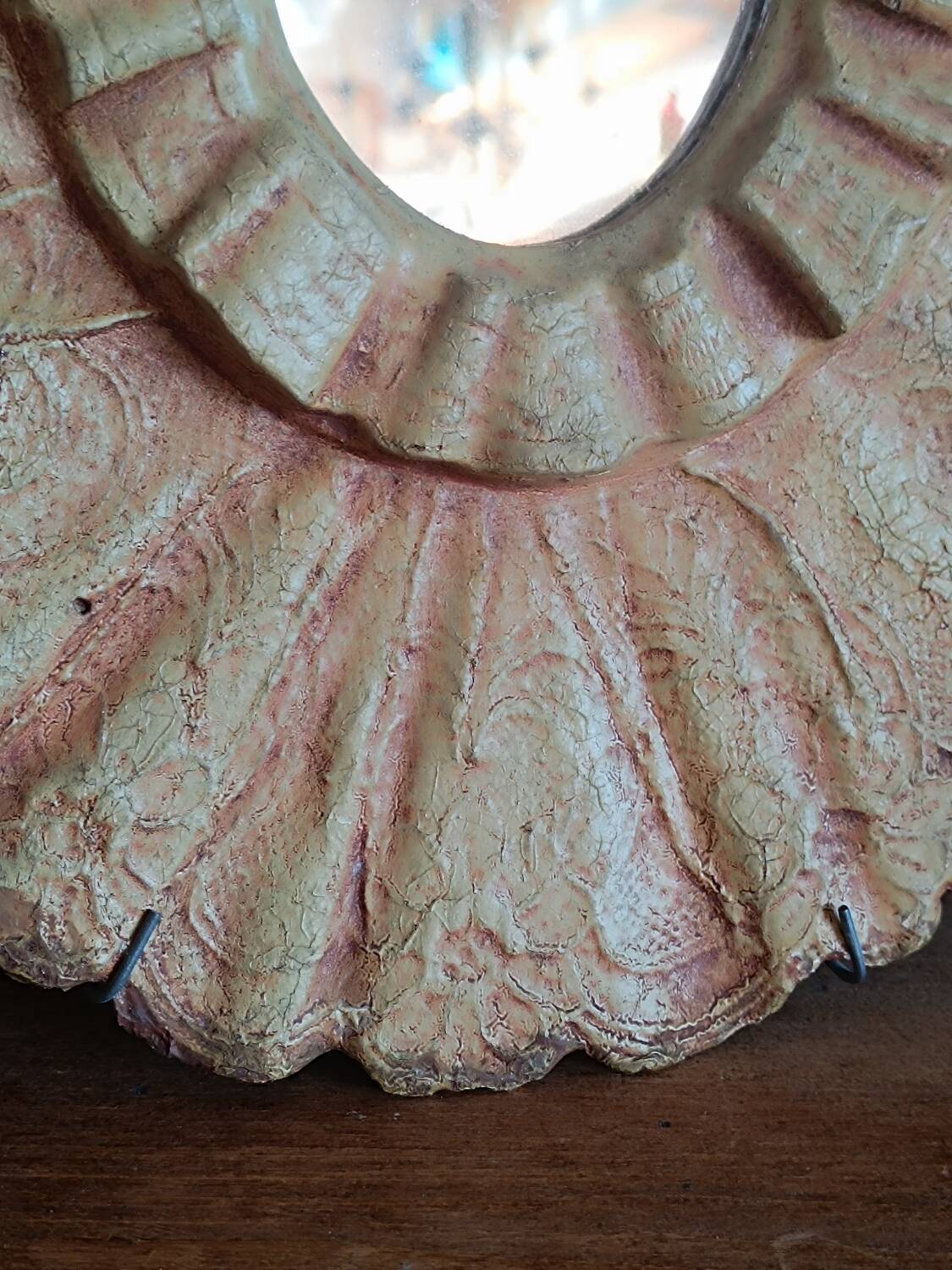 Painted oval plaster mirror