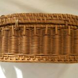 Old padded interior wicker box.