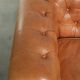 Sheepskin 2.5-seater Chesterfield sofa in a light cognac colour