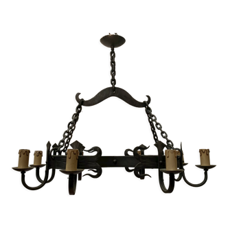 Wrought iron chandelier has eight arms of light XX century