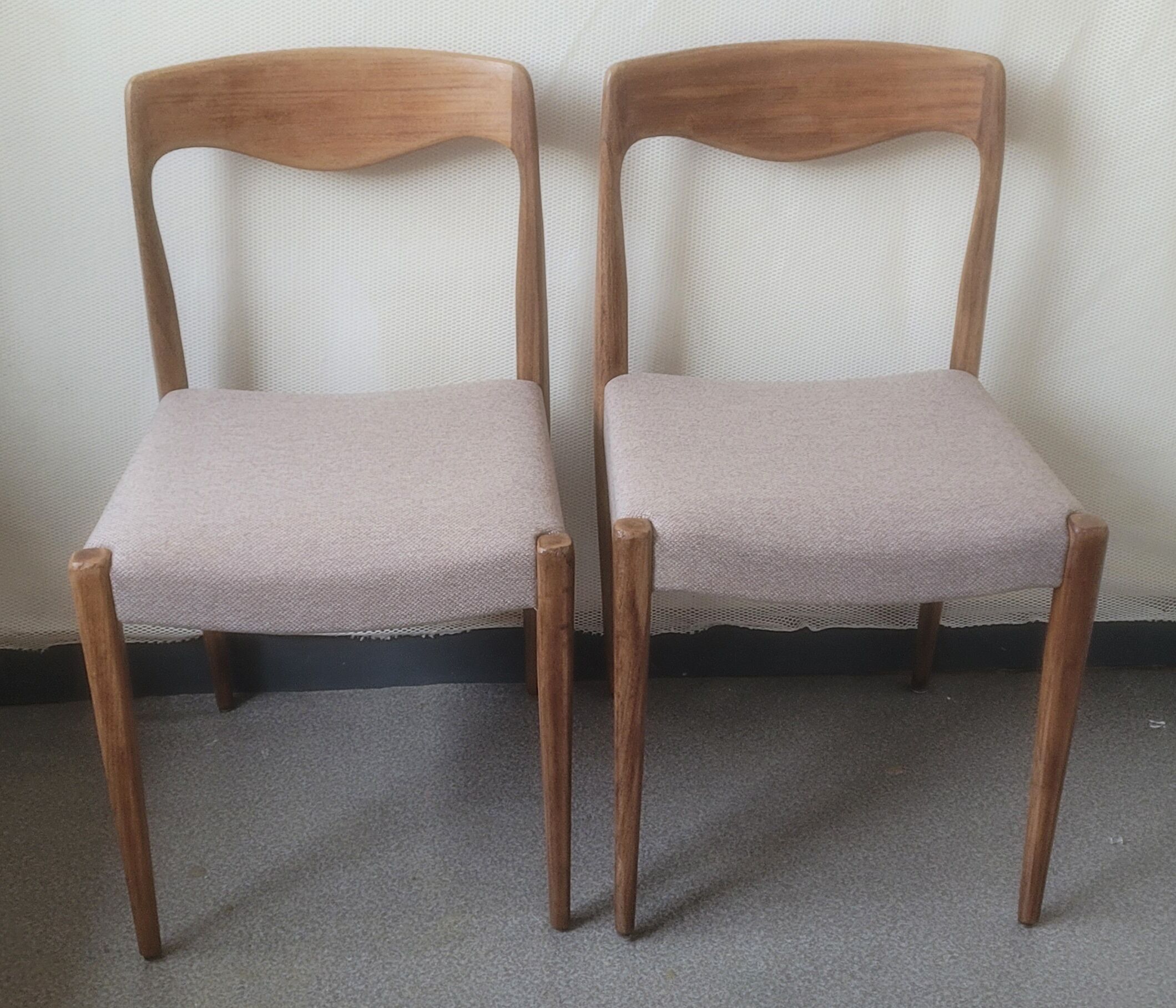 Pair of Scandinavian teak chairs sitting beige gray fabric