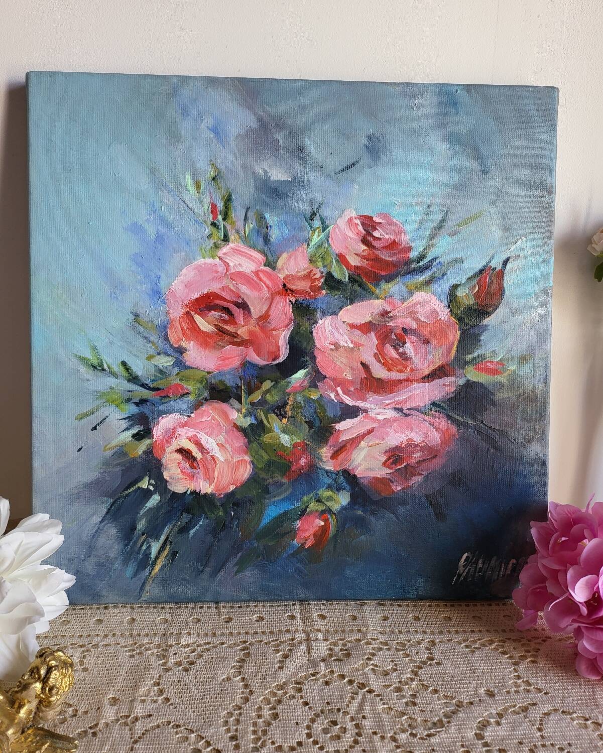 Oil on canvas painting of a bouquet of roses signed Paumier.