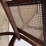 Antique folding chair with weaved seat/back