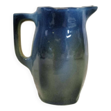 Blue glazed ceramic pitcher