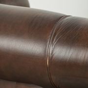 Set of a smooth chesterfield sofa and armchair with a timeless English look