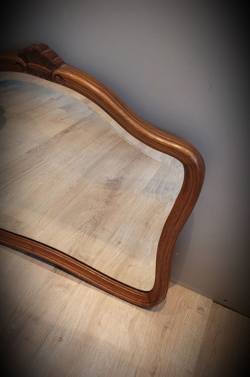 Elongated wooden mirror