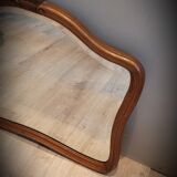 Elongated wooden mirror