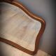 Elongated wooden mirror