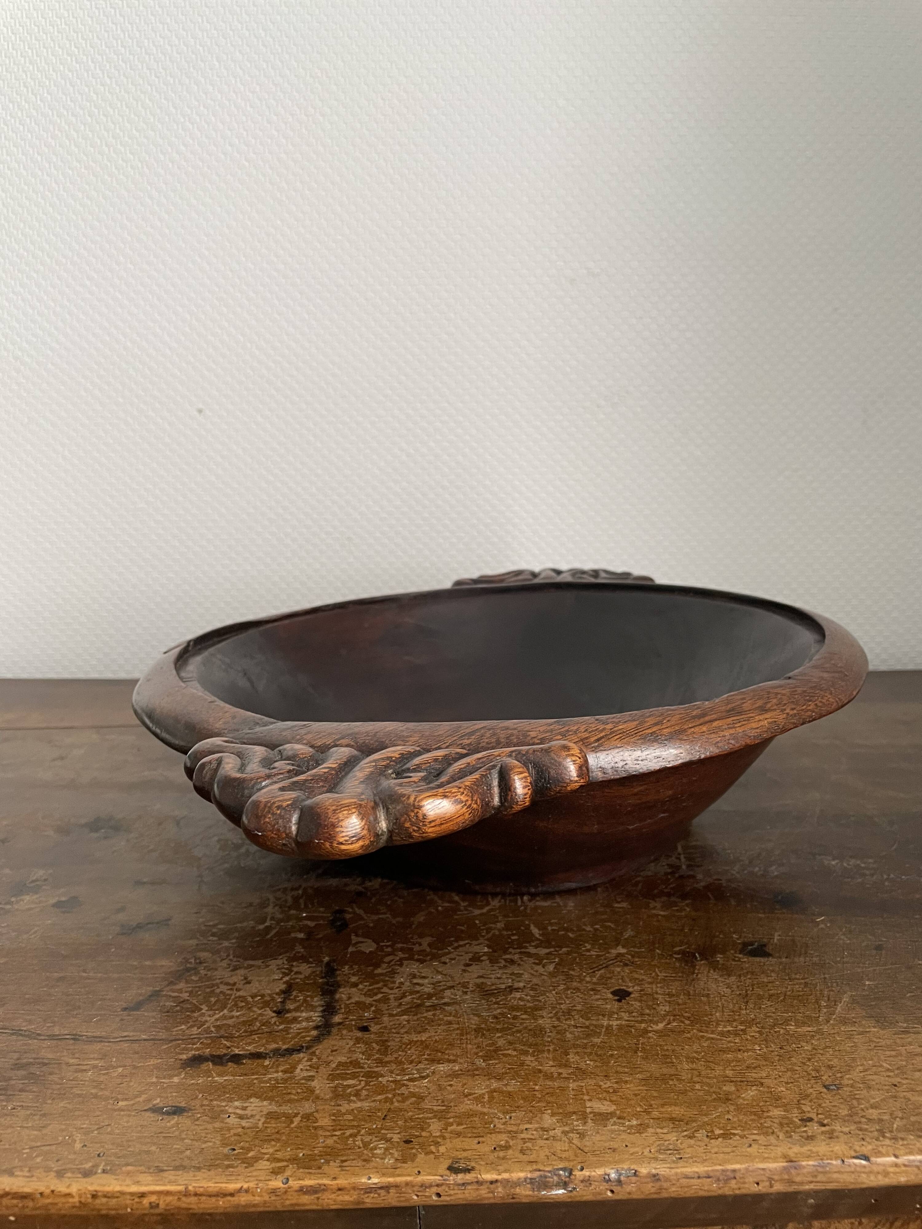 Hollow carved wooden dish