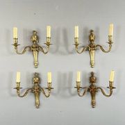 Set of four bronze wall sconces, Louis XVI style, 20th century.