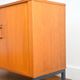 Storage cabinet with sliding curtain shutter 1950s