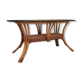 Oval rattan dining table and smoked glass