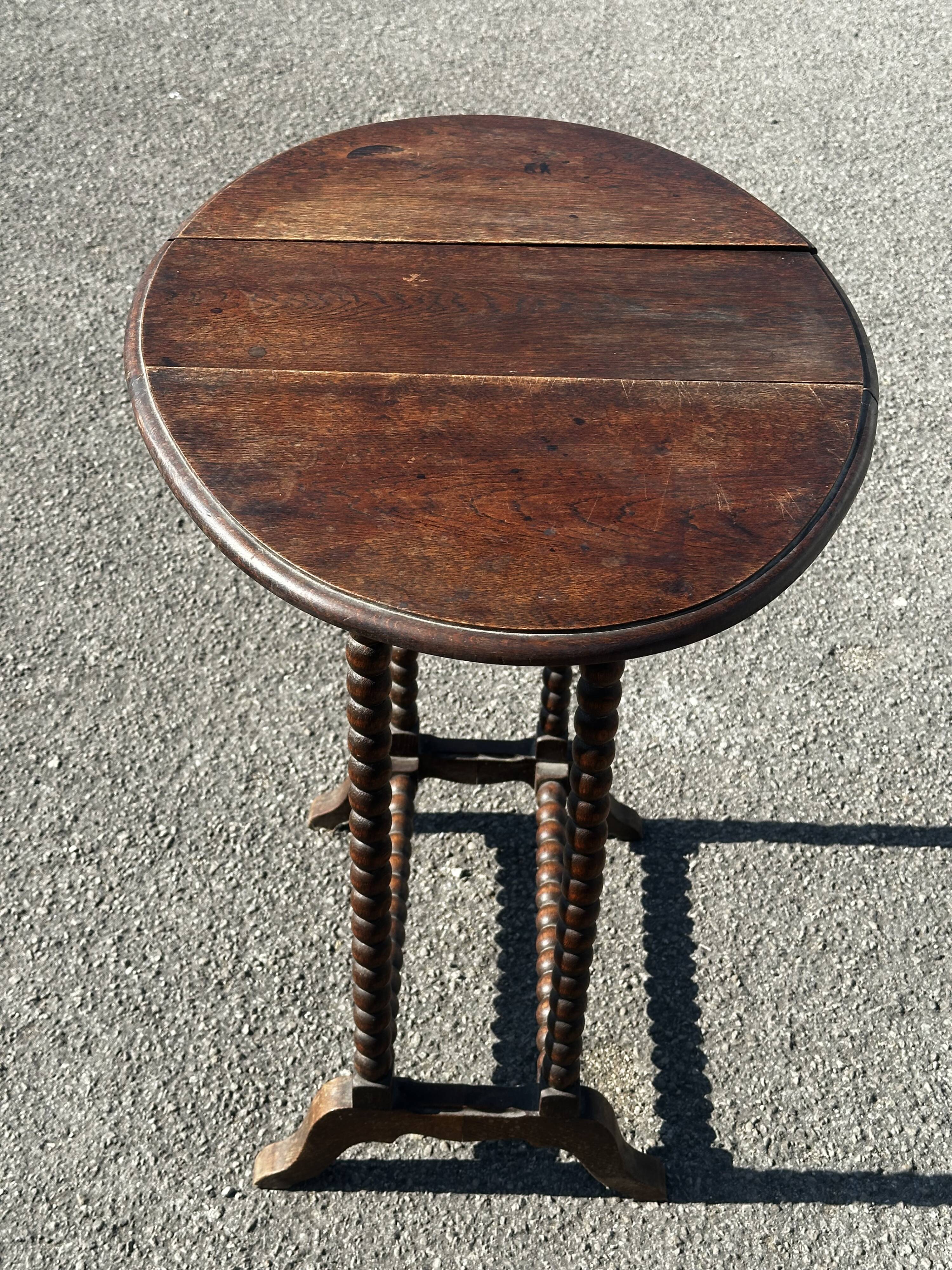 Small folding table called Gateleg, Victorian era