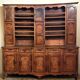 Clock cabinet from the Louis XV period in walnut and elm, fully carved.