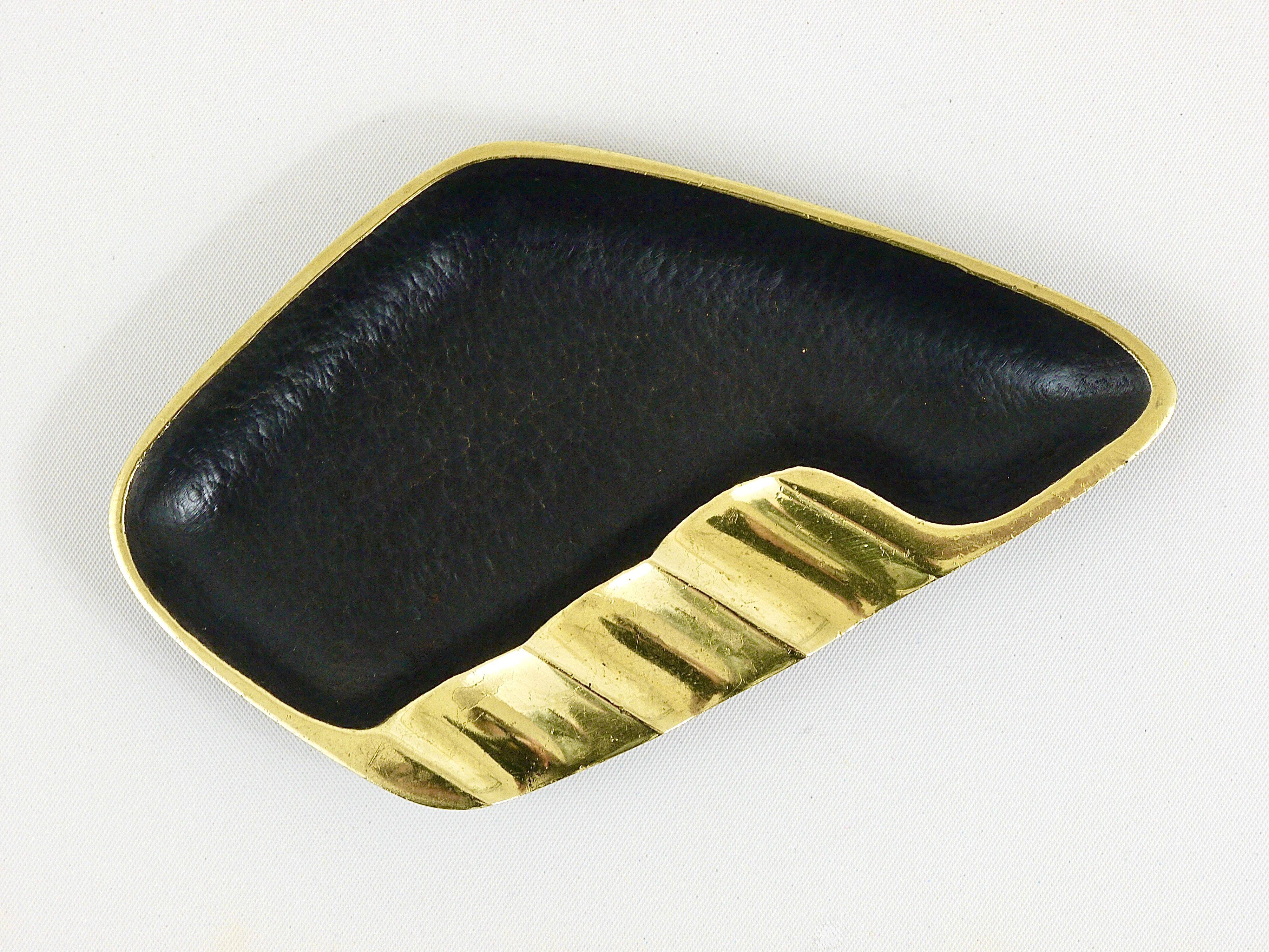 Asymmetrical modernist ashtray by Walter Bosse in black brass by Herta Baller, 1950s.
