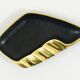 Asymmetrical modernist ashtray by Walter Bosse in black brass by Herta Baller, 1950s.