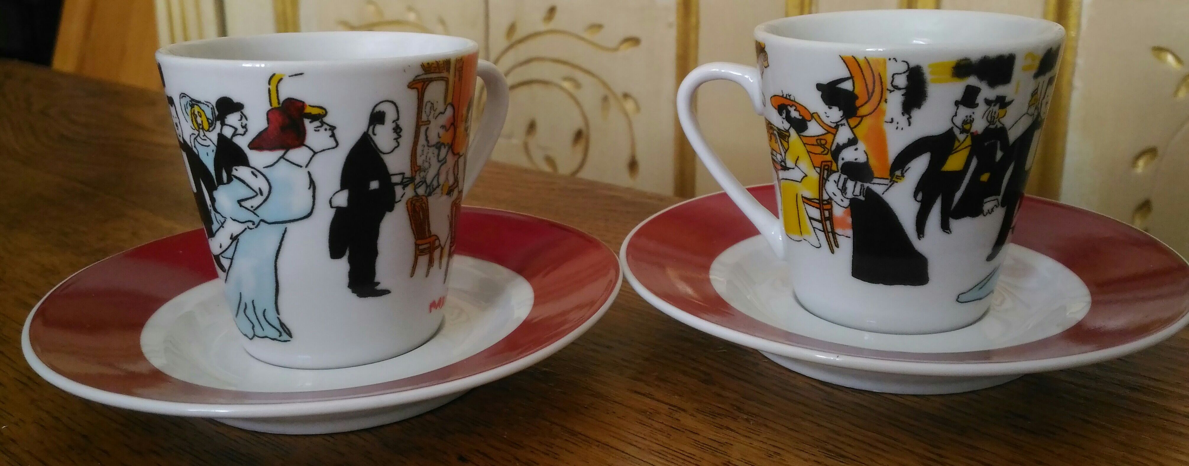 2 coffee cups with 2 porcelain saucers maxim's de paris