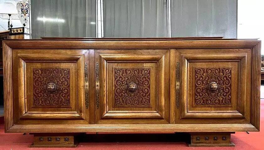 According to Charles Dudouyt: sideboard in a row from the Art Deco period in solid wood.