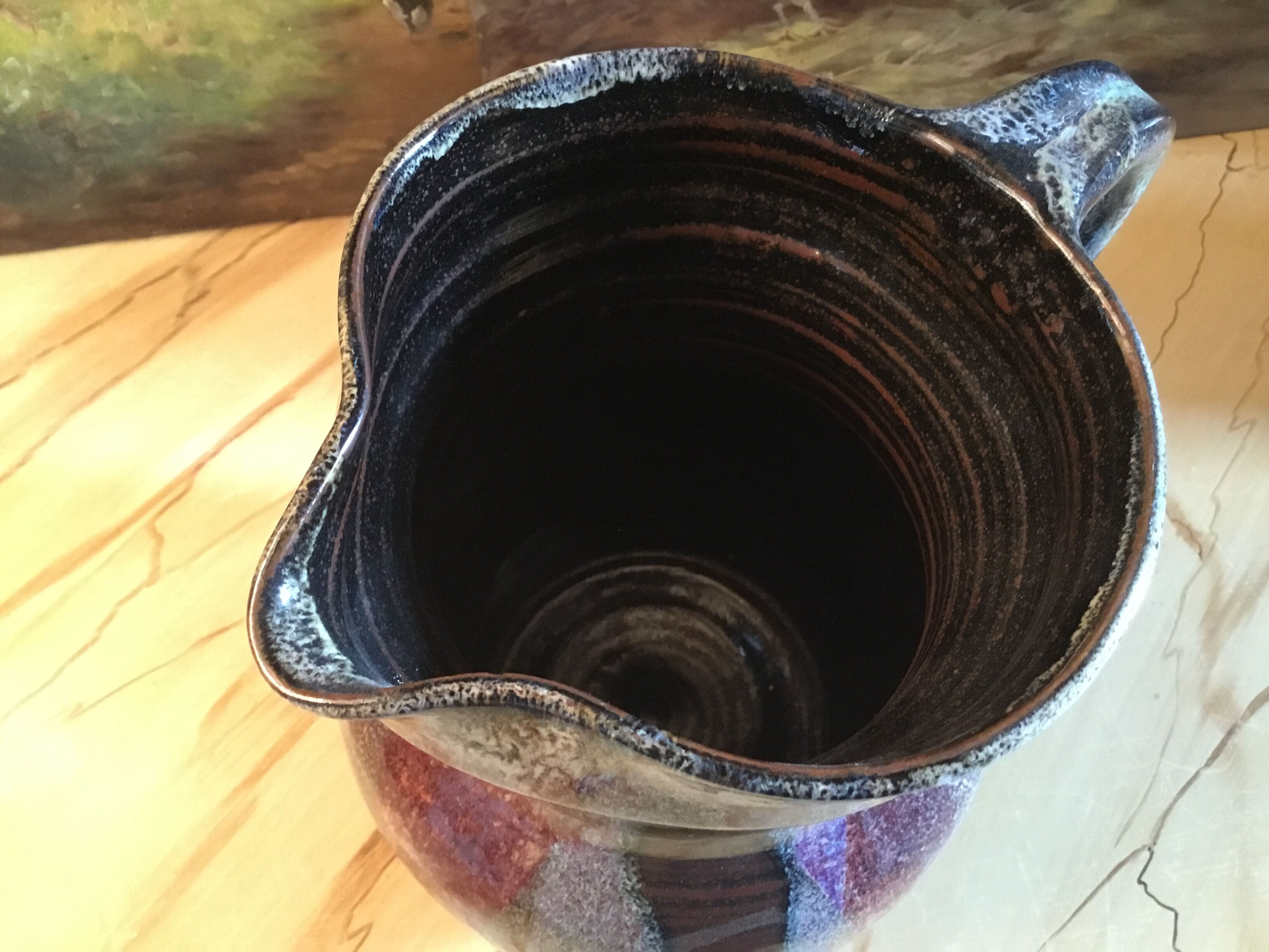 Signed varnished sandstone pitcher