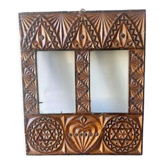 Double frame intricately carved wood