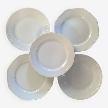 5 mismatched old white plates.