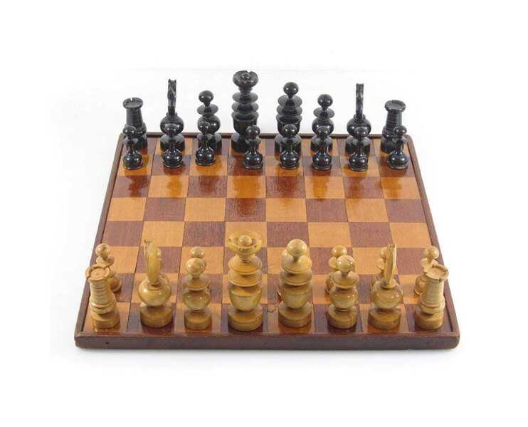 Antique wooden chess set and board