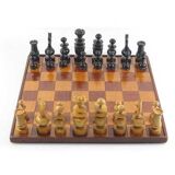 Antique wooden chess set and board