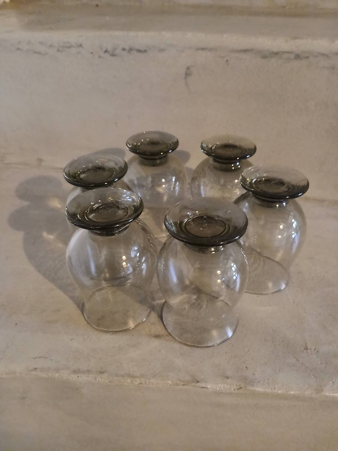 6 old smoked glasses with bubbles