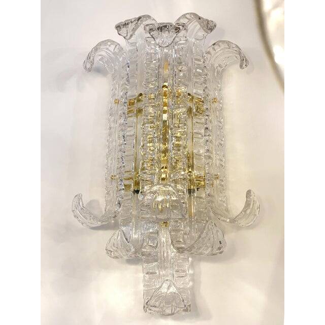 Contemporary transparent "lingue" murano glass wall lamp in barovier style