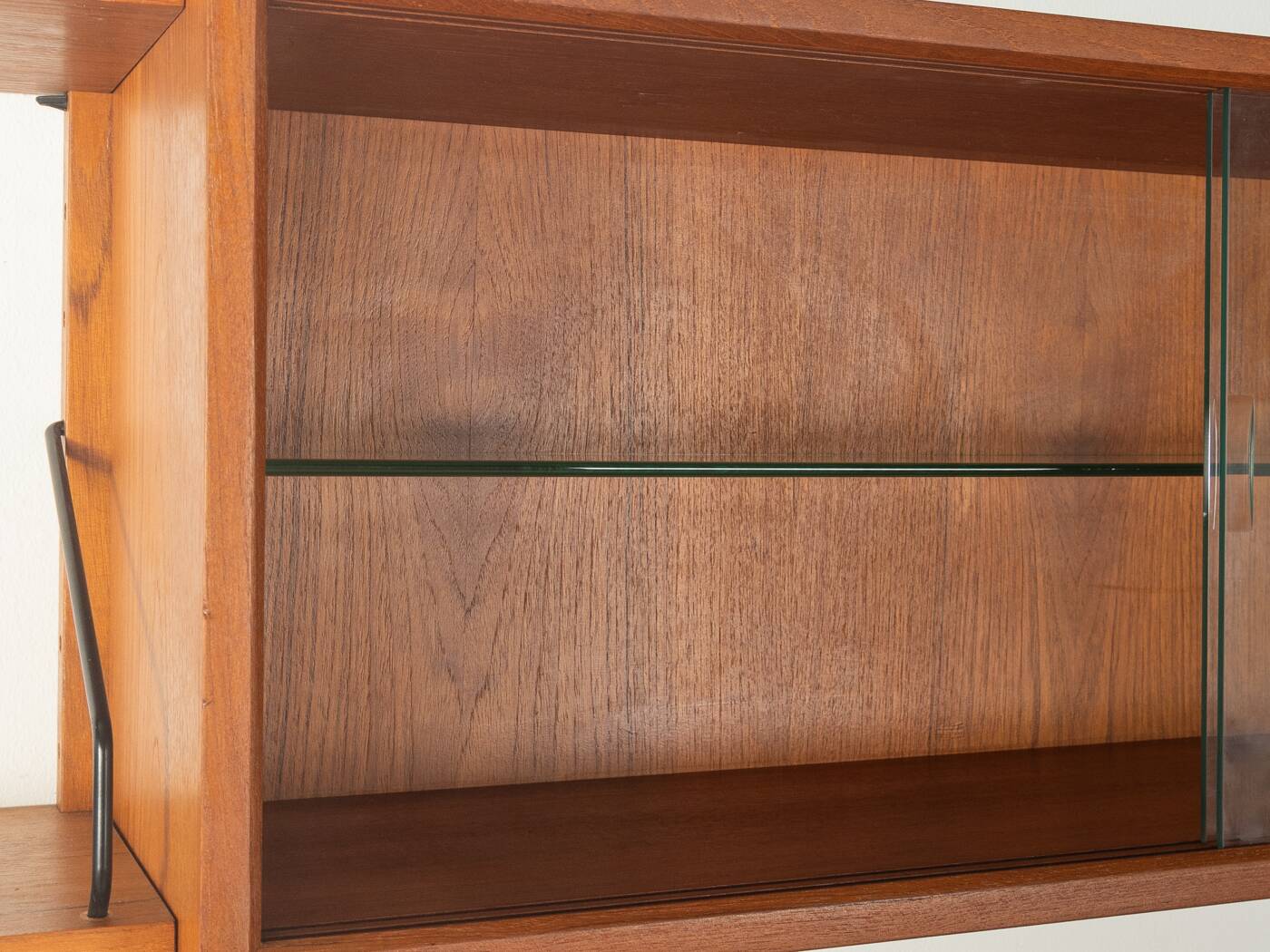 Classic shelving system from the 1950s in teak veneer by Poul Cadovius for Cado