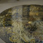 Table basse en fonte et verre églomisé néo-classique 1940’s