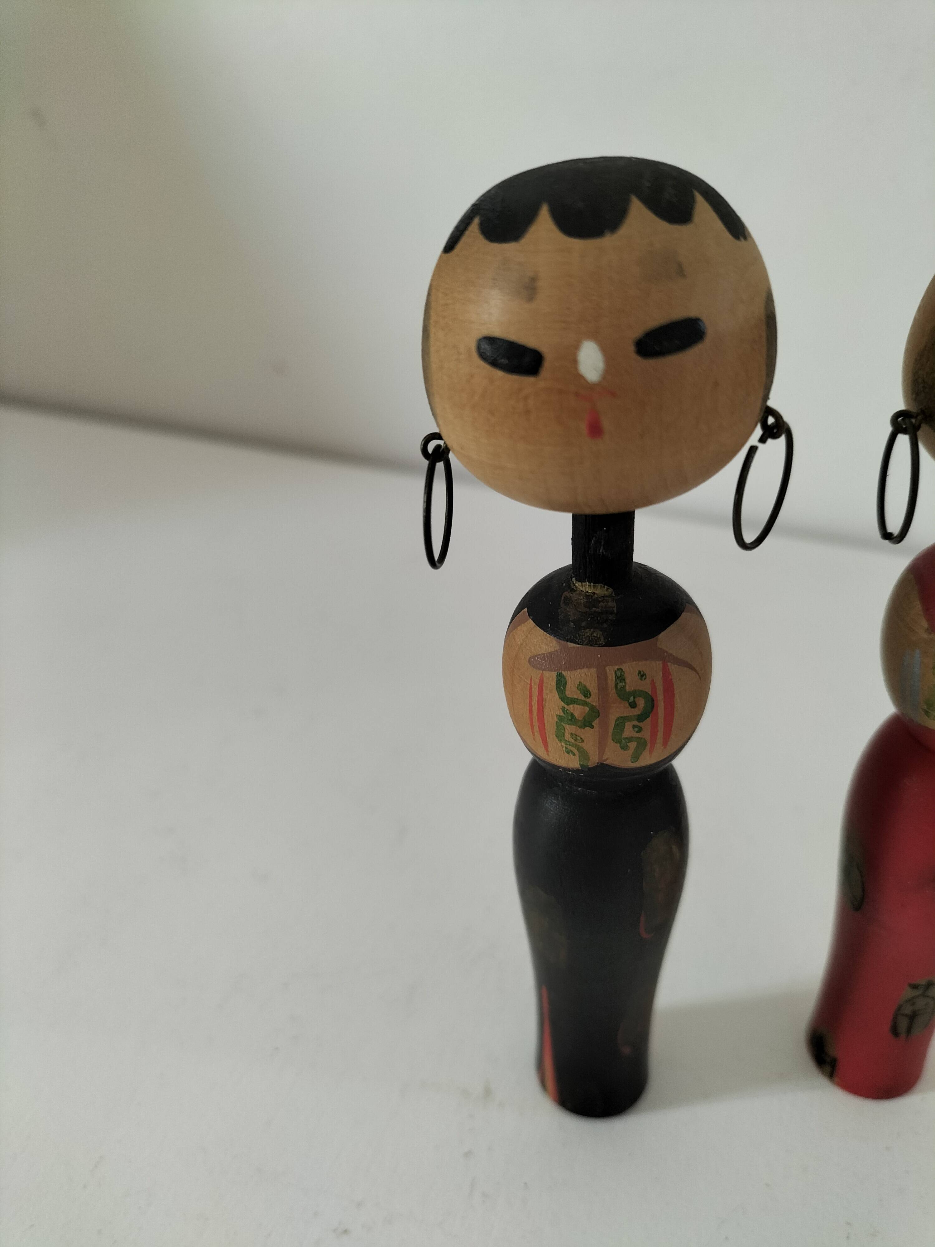 Pair of Japanese Kokeshi dolls - 1950s-1970s