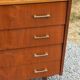 Vintage walnut varnished chest of drawers with 4 drawers from the 1960s.