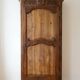 Antique carved wooden wardrobe with cornice.