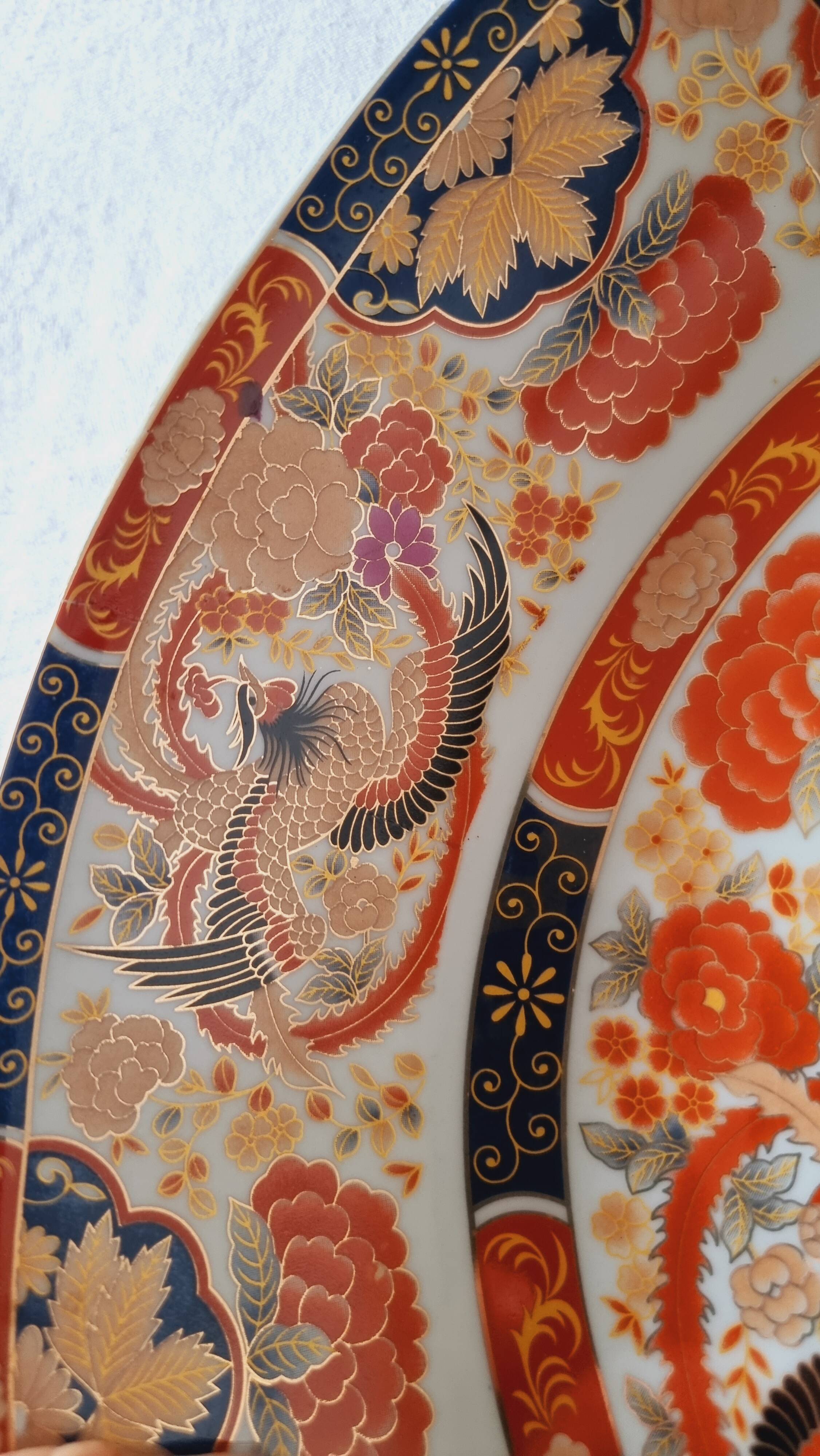 Large deep porcelain plate in Imari style (35.5 cm) with "Phe" decoration.