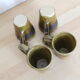 4-cup green and black ceramic set