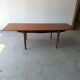 Rectangular extendable table in Scandinavian design made of solid teak.