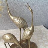 Golden brass herons