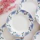 Set of 8 Saint-Amand flat plates, floral decoration